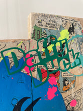 Charger l&#39;image dans la galerie, Contemporary pop art Daffy Duck artwork on wood with vibrant colors and eclectic mixed media.